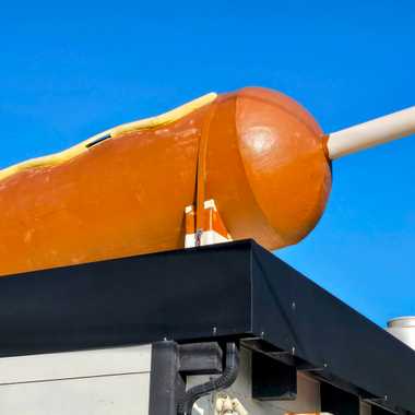 The World&#8217;s Largest Corn Dog is a 30-foot-long fiberglass structure on the roof of the Original Pronto Pup.