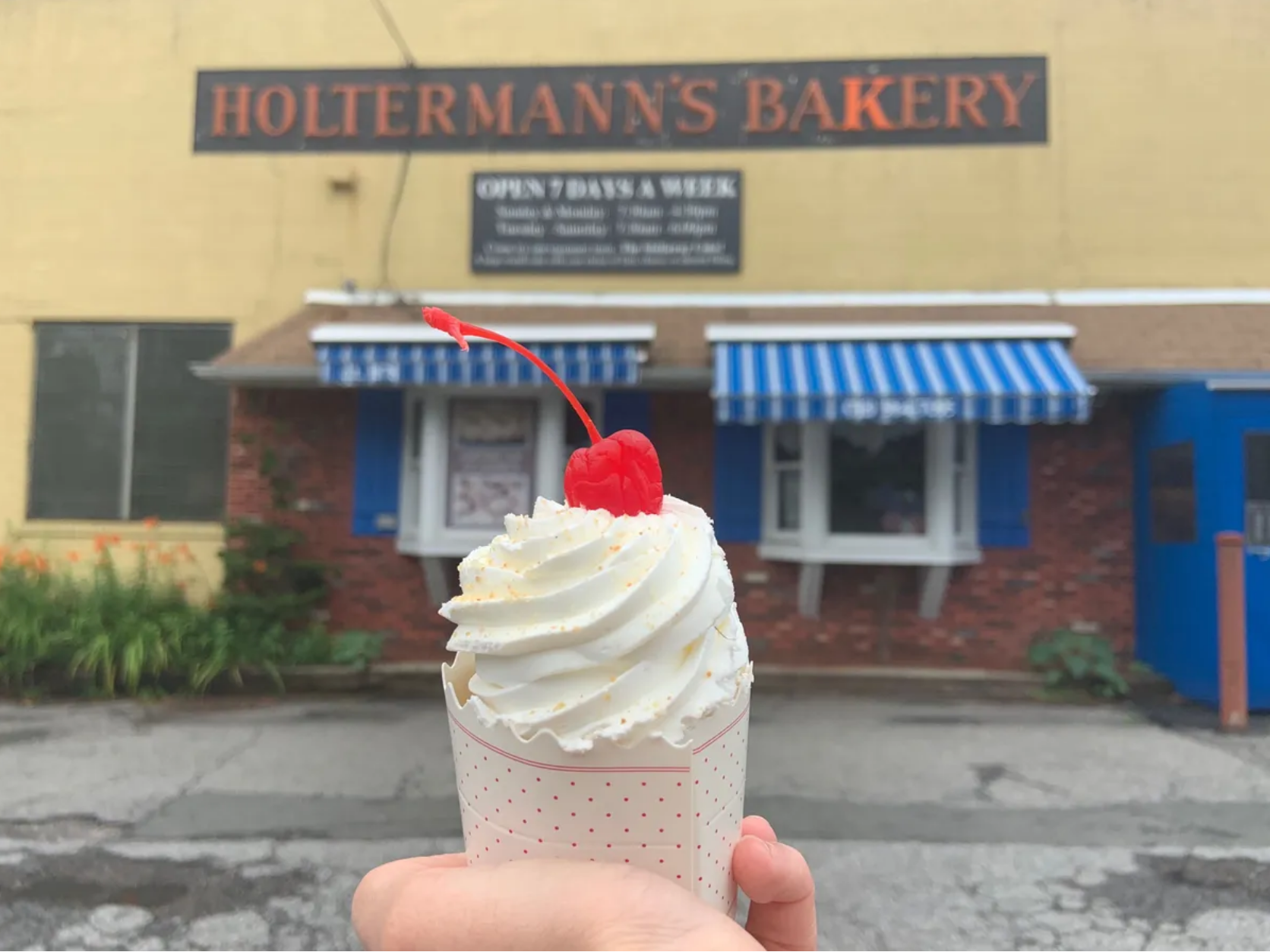 Holtermann's Bakery serves its signature Charlotte Russe in a Push Pop-like container.
